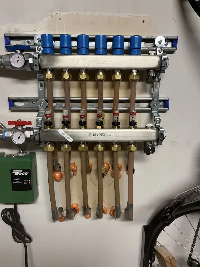 Plumber performing Leak Detection at a residential property in Green